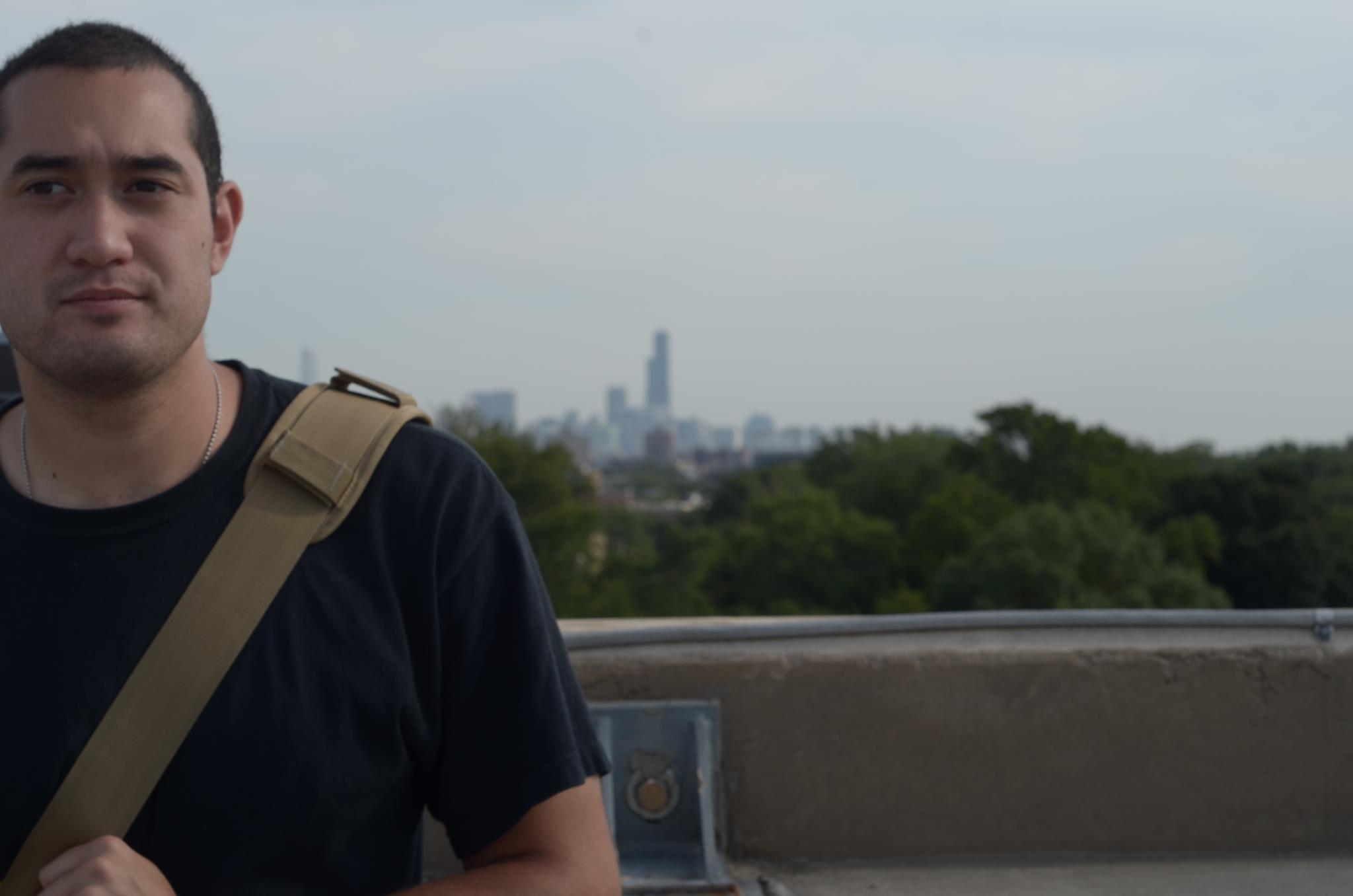 picture of michael amey standing in front of chicago skyline